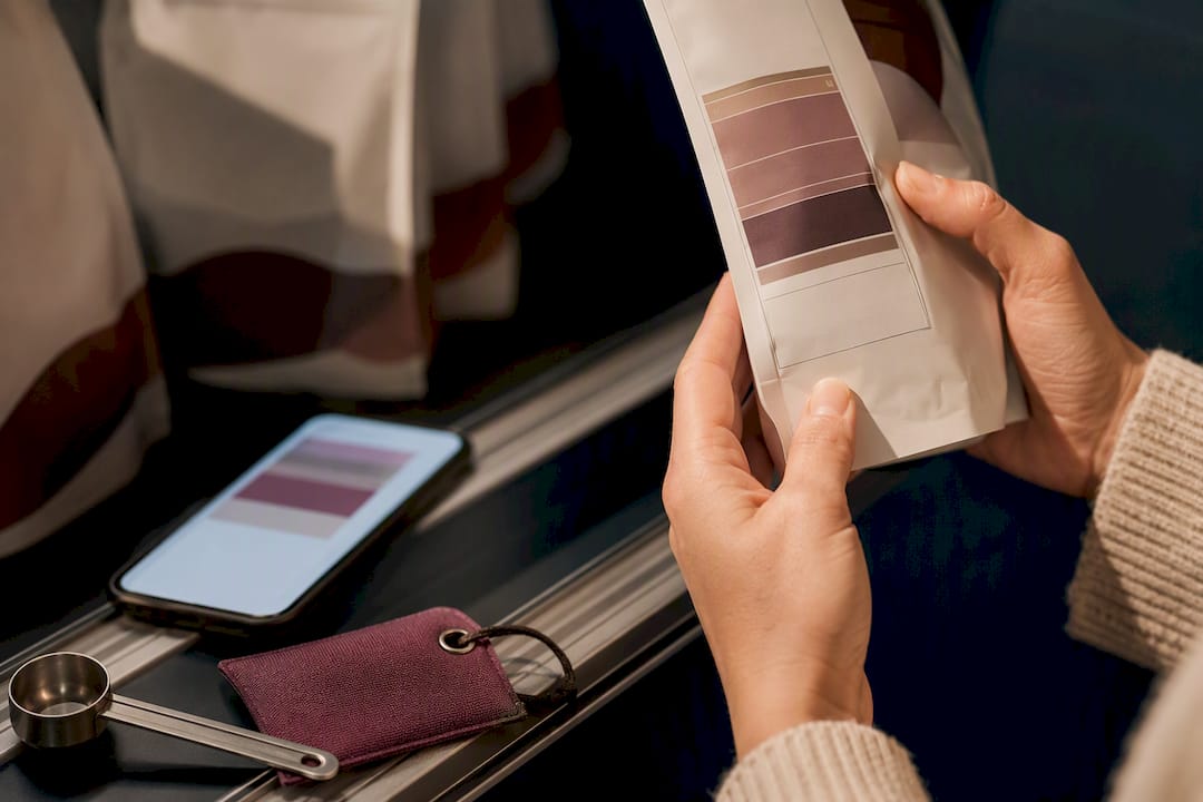 Hands checking an anonymous coffee label