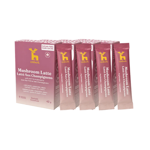 Four boxes of Emberk Mushroom Latte sachets with individual packets arranged in front on a white background.