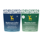 Two Emberk pouches side by side on a white background. The left pouch is dark blue and labeled Mushroom Coffee and the right one is green labeled Matcha Latte