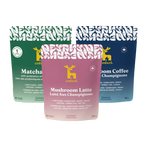 Three pouches arranged together: Matcha Latte with probiotics, Mushroom Latte, and Mushroom Coffee. The front pouch is pink and labeled Mushroom Latte, with a deer logo, while the rear pouches are green and blue.