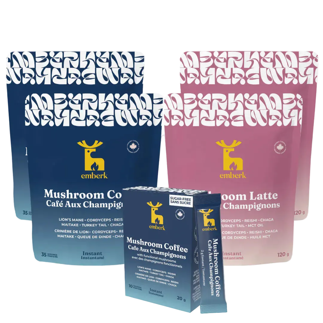 Emberk Ultimate Kit with two pouches of Mushroom Coffee, two pouches of mushroom latte, and one mushroom coffee travel pack, shown in blue and pink packaging on a white background